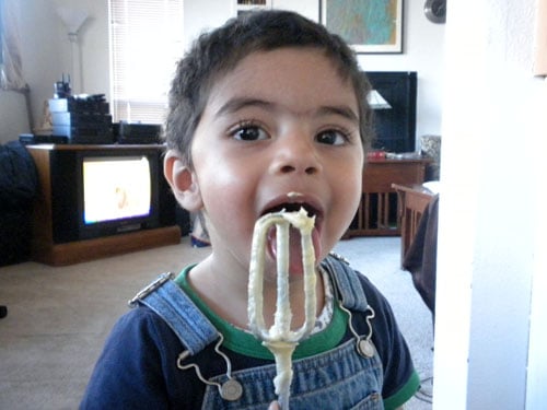 My son eating some food, with Marble cake dough