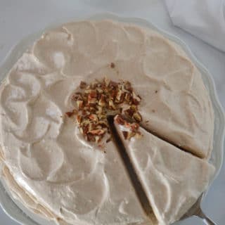 A plate with cinnamon cake on top