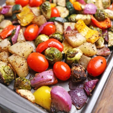 roasted vegetables on a baking sheet.