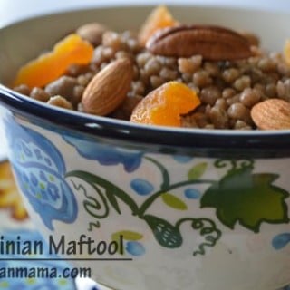 A bowl of Lentils on a plate, with Nuts