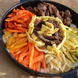 A skillet of korean bibimbap.