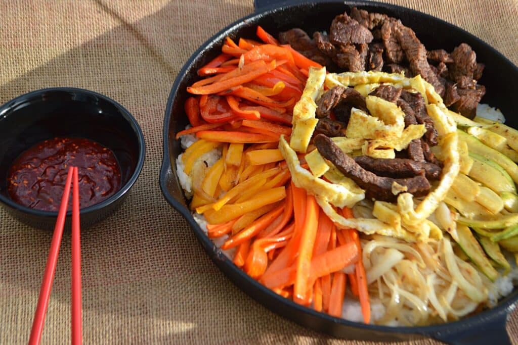 A skillet of korean bibimbap.