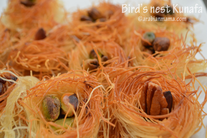 A close up of knafeh like bird\'s nest with nuts