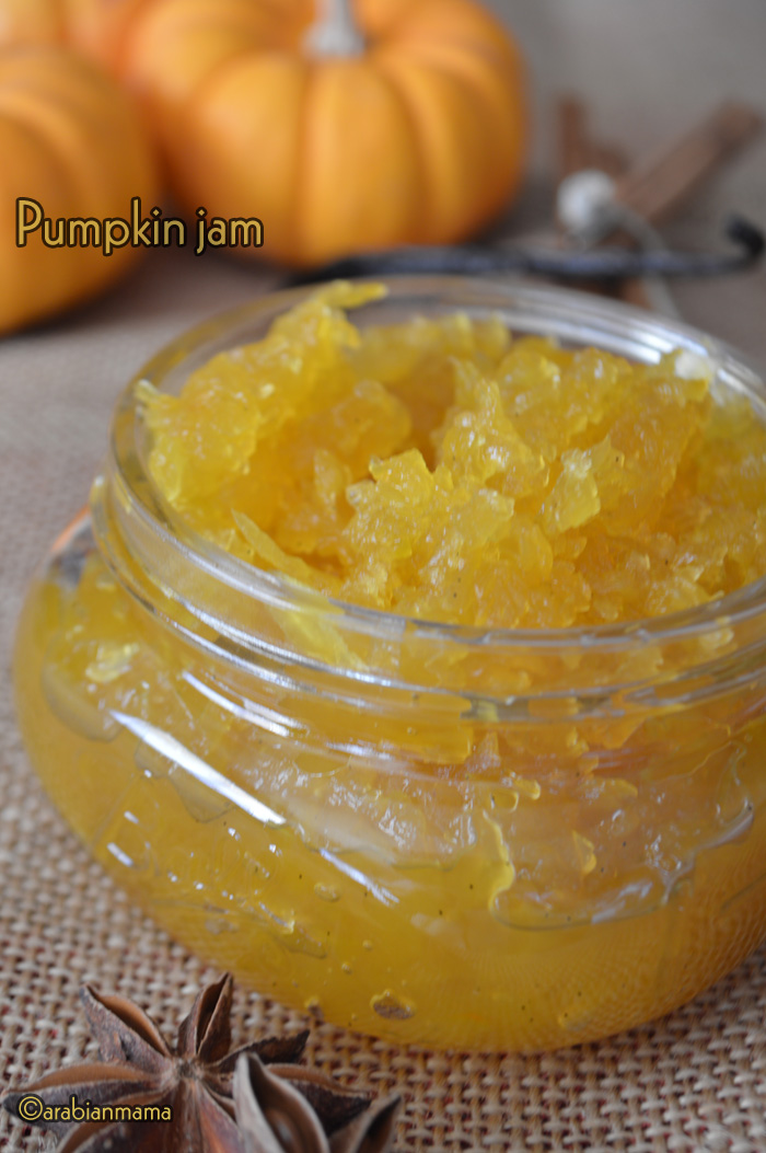 A close up of jar of pumpkin jam on a table