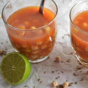 A glass of chickpeas drink and lemon
