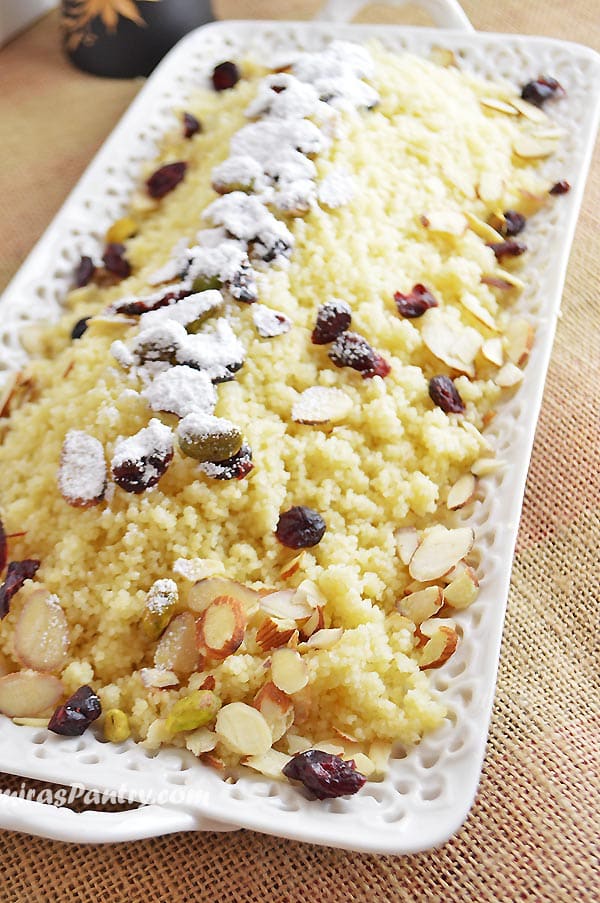 A close up of food, with Couscous and nuts