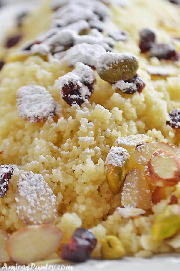 A close up of food, with Couscous and nuts