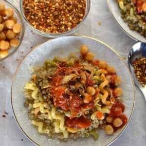 Egyptian Koshari made with quinoa on a plate.