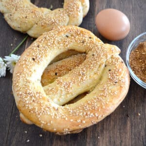 Egyptian simit on a wooden table with eggs.