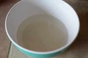 A bowl of water on a table