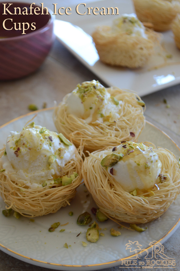 A plate of food on a table, with Knafeh and Ice Cream