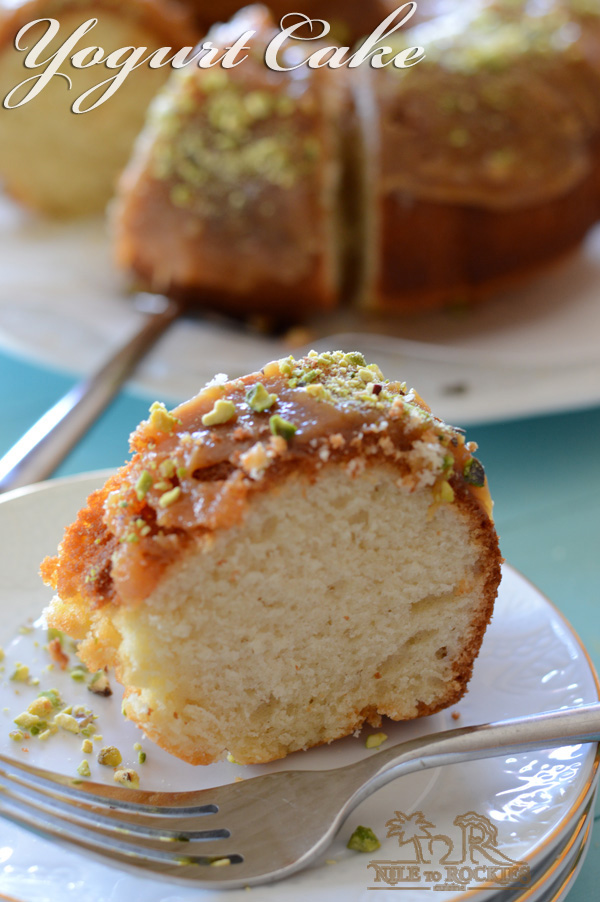 A close up of a piece of cake with nuts