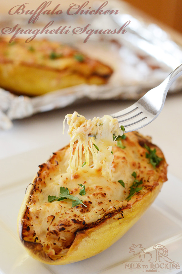 A piece of spaghetti squash on a plate, with Chicken and cheese