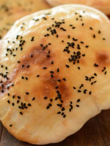 A close up look at a loaf of Egyptian bread.