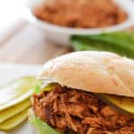 An easy and quick bbq pulled chicken sandwiches recipe for your next party, throw everything in the slow cooker and let it do its magic