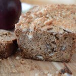 A piece of bread on a wooden board