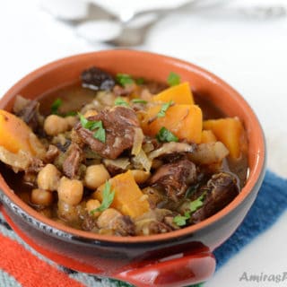 A bowl of soup, with Beef and Butternut squash