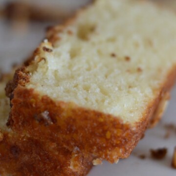 A close up of a slice of cake on a plate, with Cinnamon cake