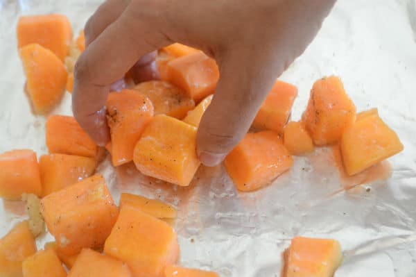 Butternut squash and a hand