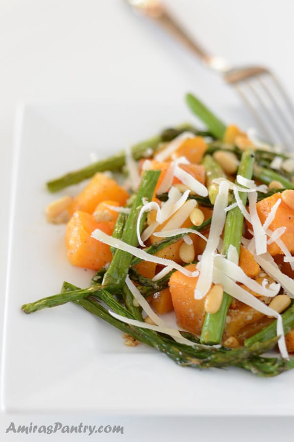 A close up of a plate of food with Butternut squash and vegetables