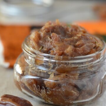 A close up of food in a jar with date paste