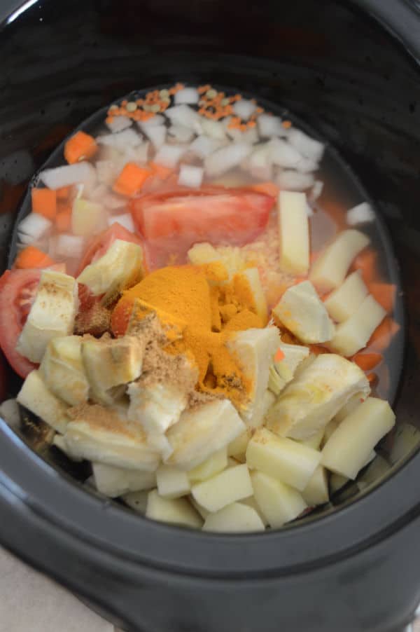 A bowl of food with vegetables