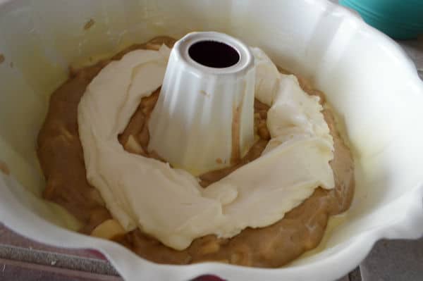 A photo showing a bowl with a mixture and dough