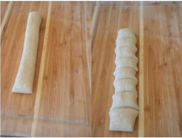 A wooden cutting board, with pieces of dough