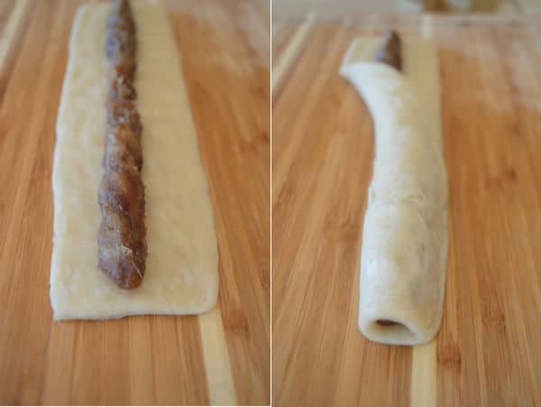 A wooden cutting board, with pieces of dough and stuffing