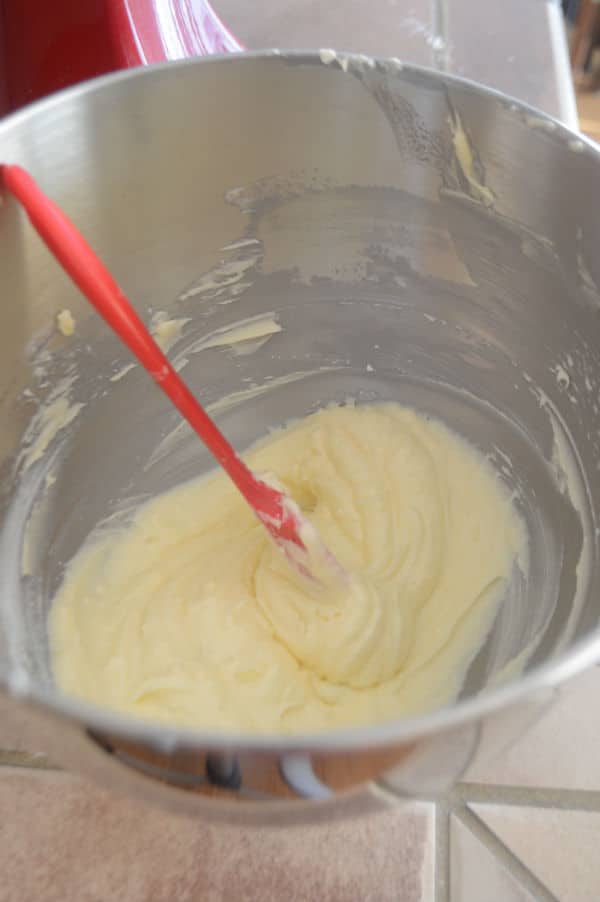 Mixer bowl with butter, shortening and sugar creamed together.