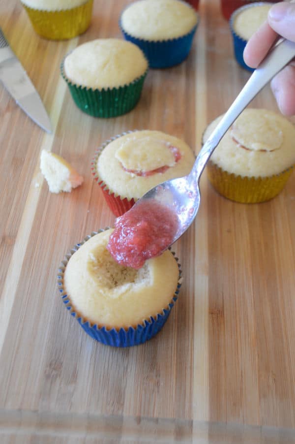 Food on a wooden table, with Cupcake and Strawberry