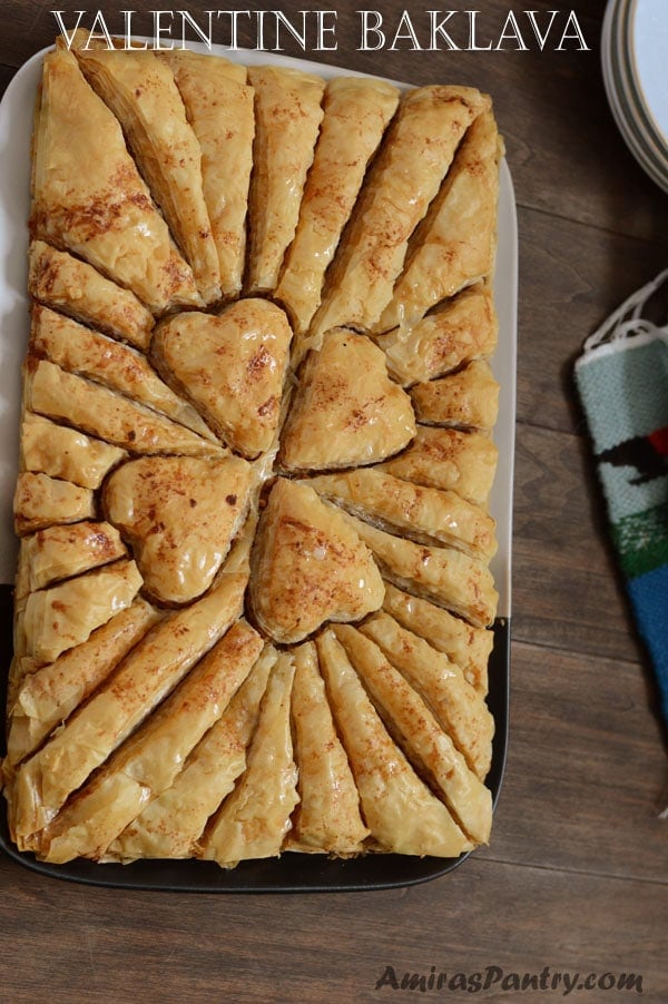 Photo showing Baklava hearts and slices in a plate