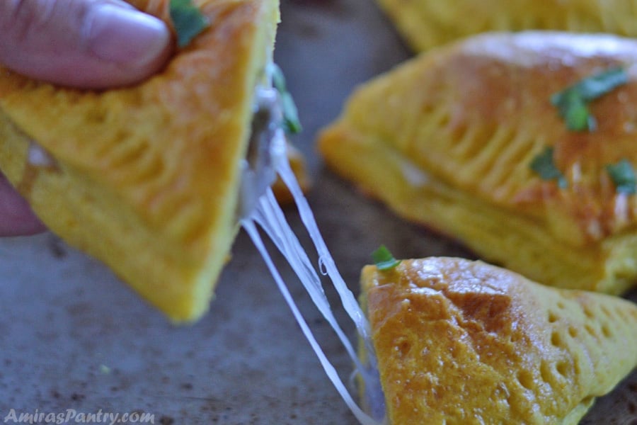 A piece of food, with Börek and Roast beef