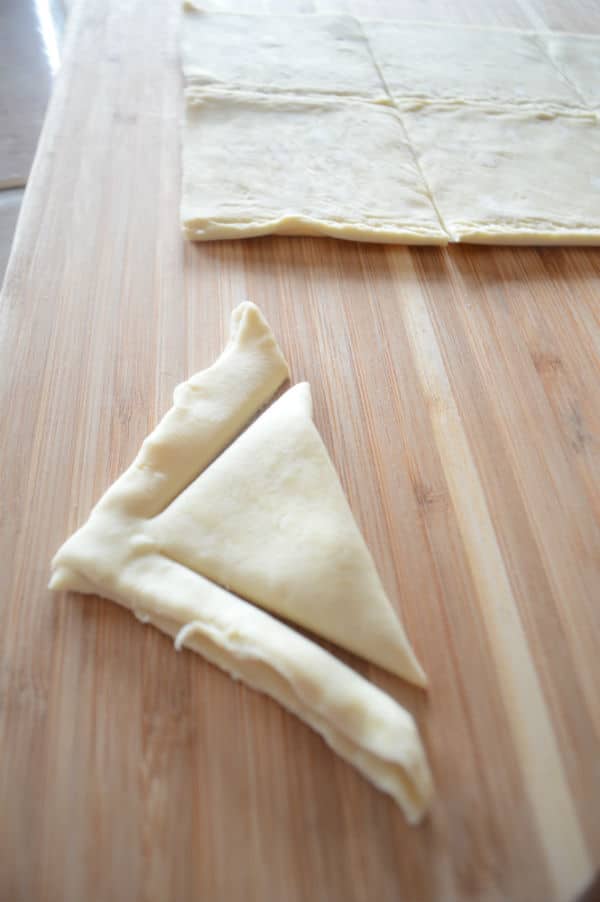 A cut dough on a wooden table