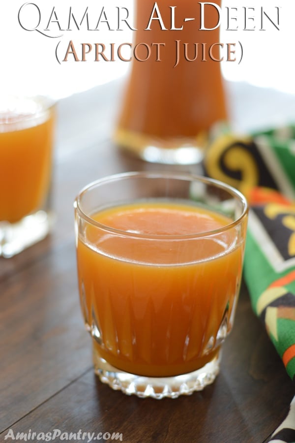 A close up of glass of apricot juice 