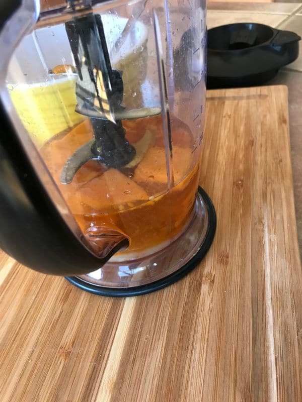A blender with dried apricot inside
