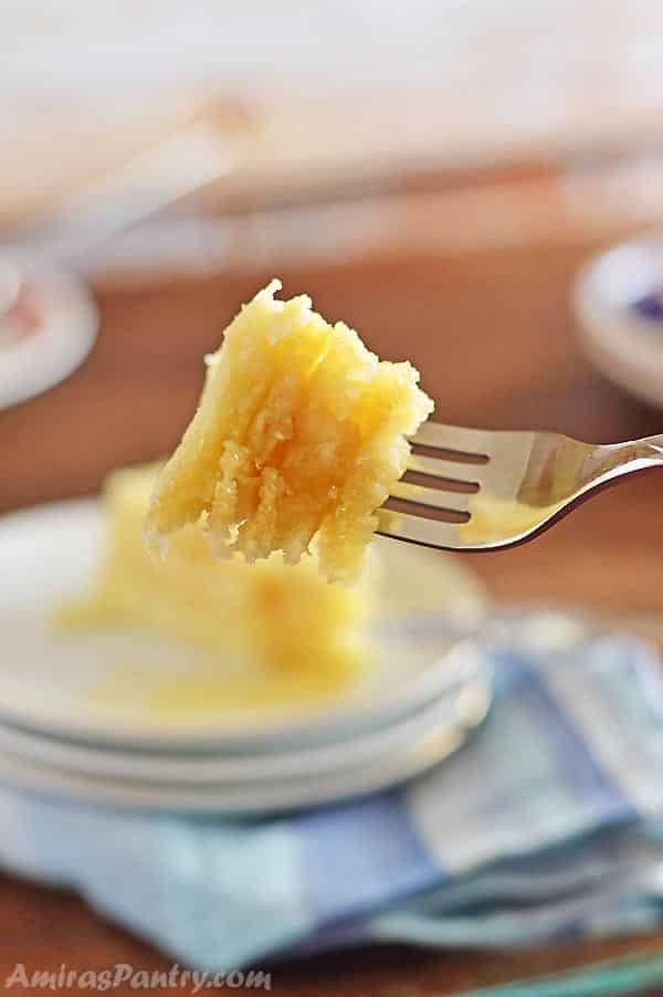 A fork holding some bites of Moroccan pancakes.