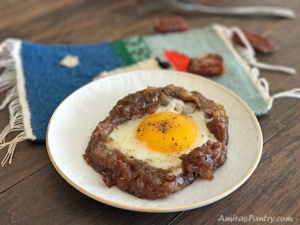 A plate of food, with Egg and date paste