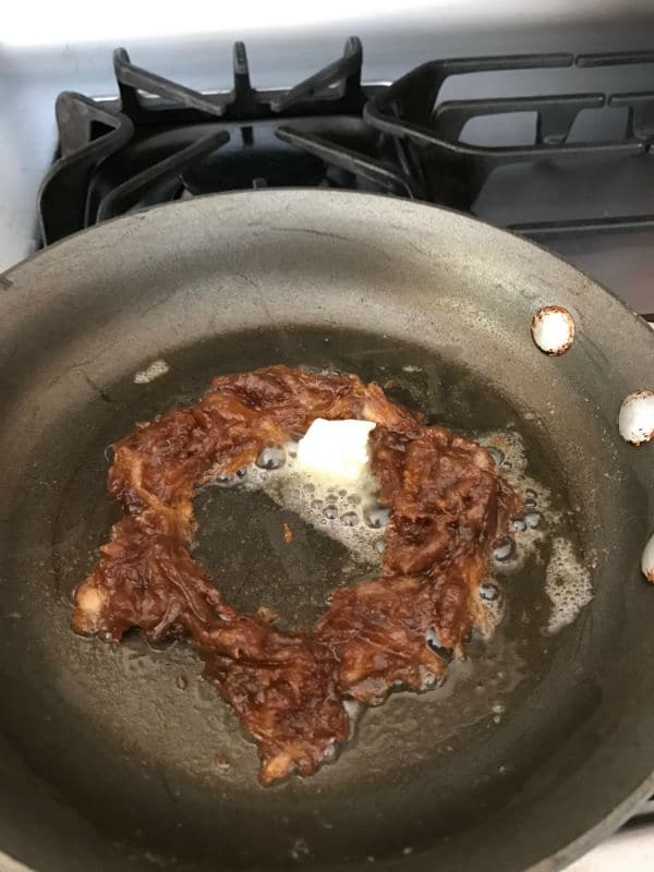 A pan of food on a stove top oven with date paste