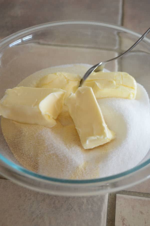 A bowl on a table, with butter and mixture