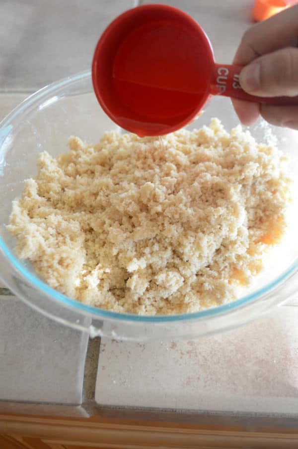 A bowl on a table, with butter and mixture