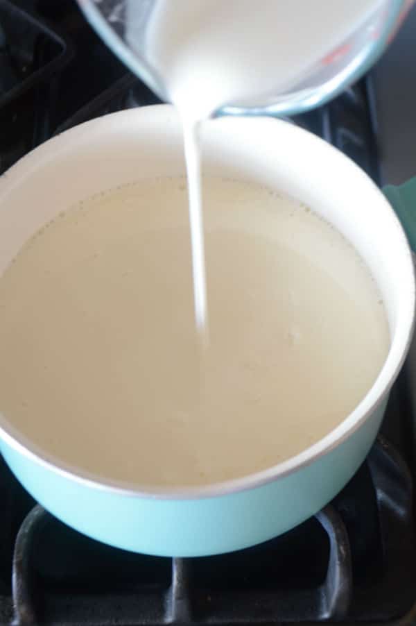 A pan on stove with milk