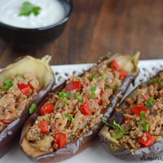 A close up of a plate of food, with Eggplant Boats