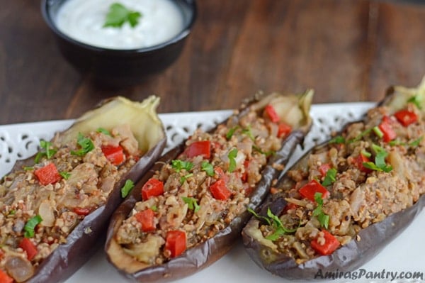 A close up of a plate of food, with Eggplant Boats