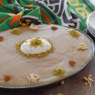 A plate with food on a table, with semolina pudding