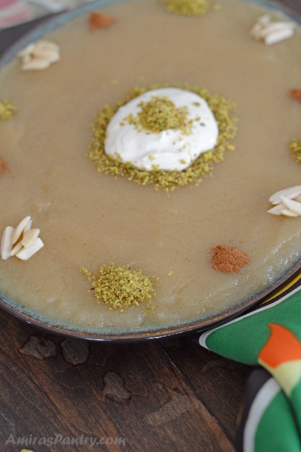 A plate with food on a table, with semolina pudding