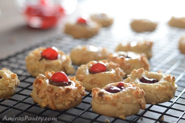 A close up of ruby gem thumbprint cookies