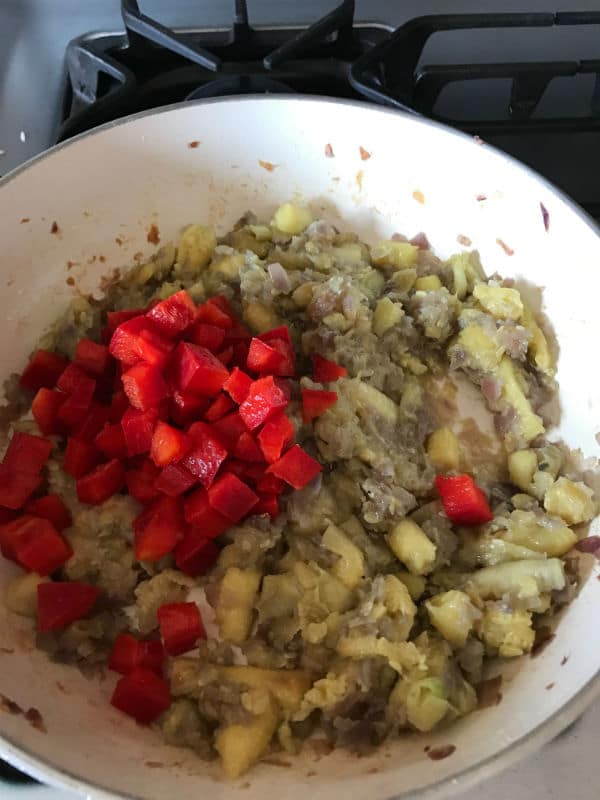 A bowl of food mixture for making zucchini recipe