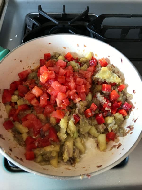 A bowl of food mixture for making zucchini recipe