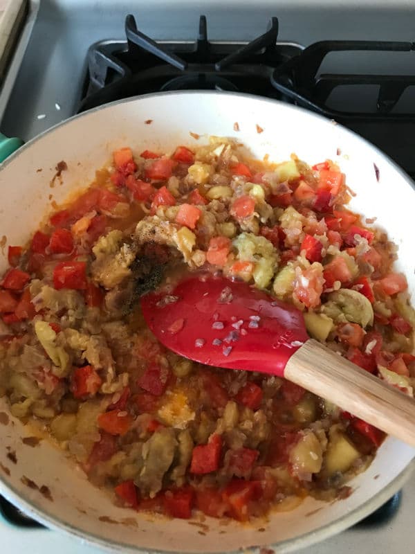 A bowl of food mixture for making zucchini recipe